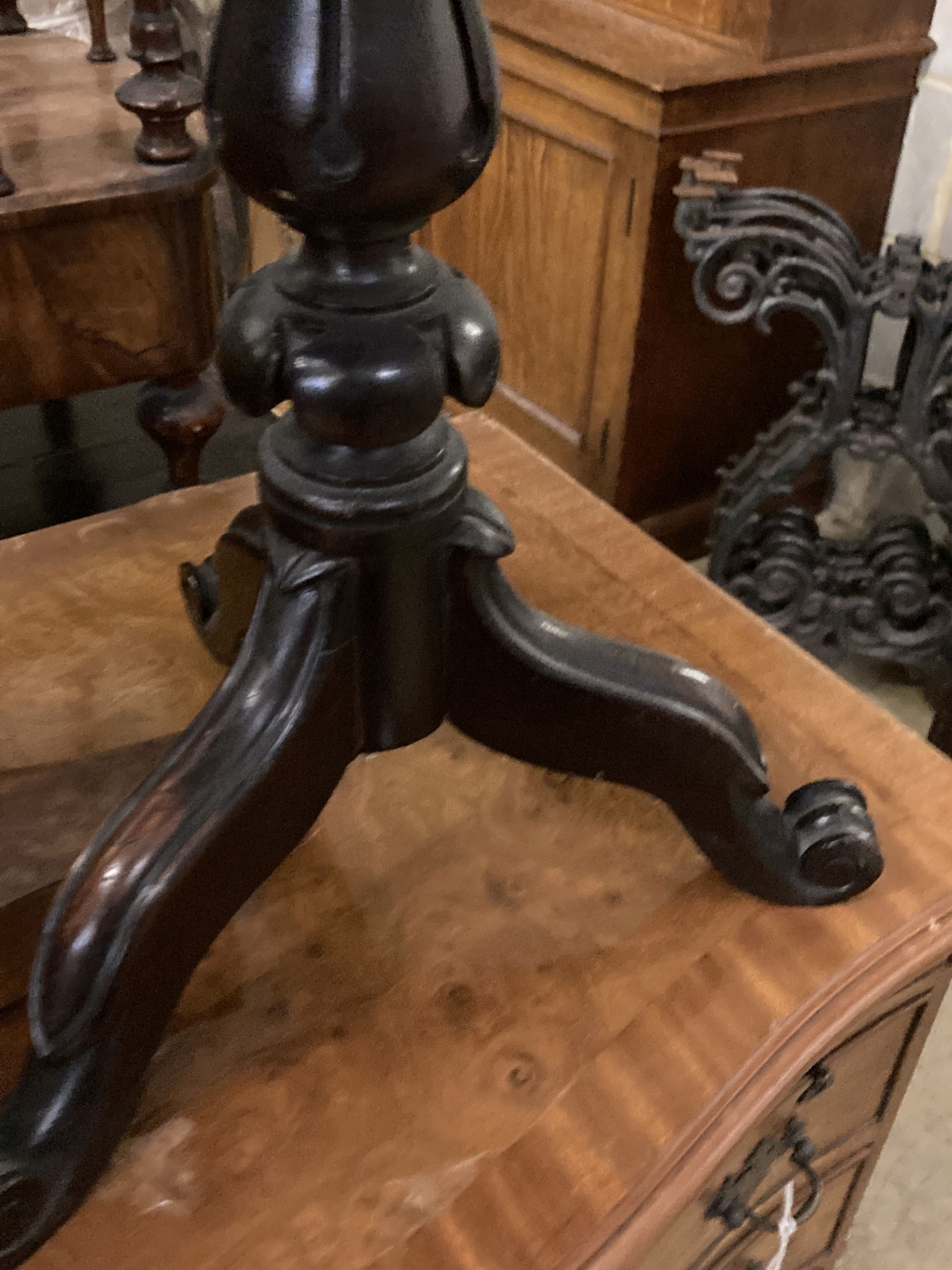 A Victorian rosewood table, with square floral tapestry inset top, over fluted bulbous pillar and triform platform base, height 63cm to